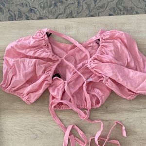 Baby pink open cross back crop top